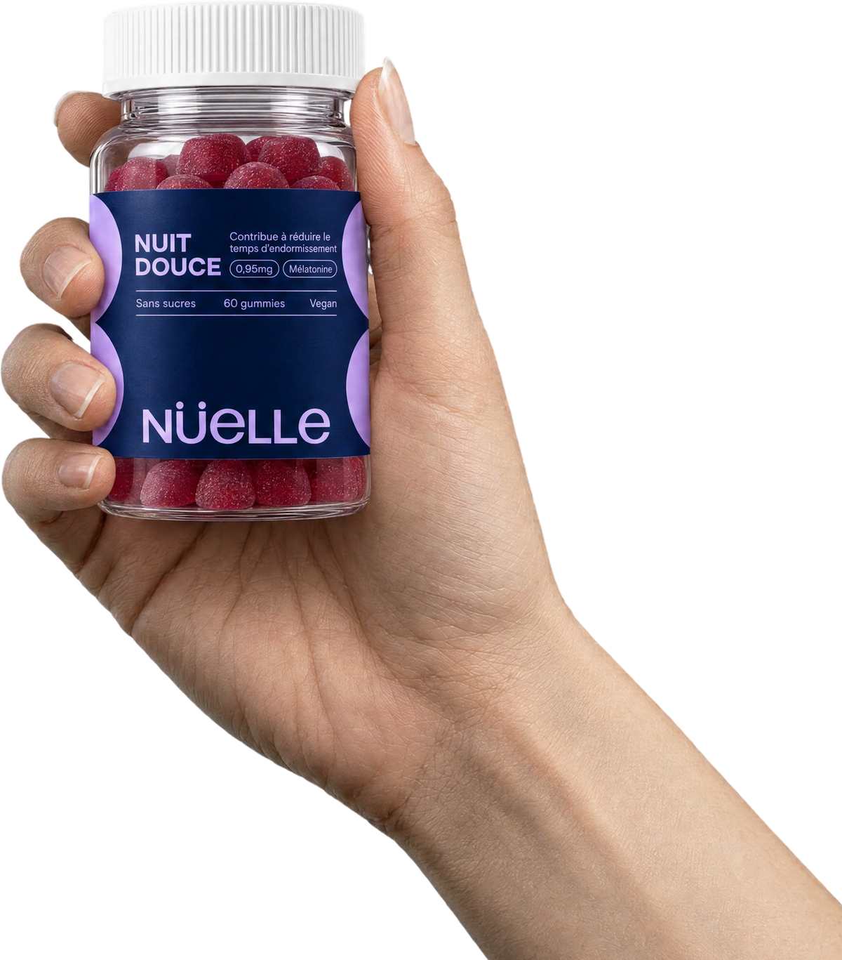 Main de femme tenant un pot de gommes NUIT DOUCE NÜELLE